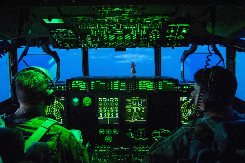Air Force C-130 Hercules aircraft pilots prepare to land at Bagram Airfield, Afghanistan, March 22, 2018. DoD photo by Navy Petty Officer 1st Class Dominique A. Pineiro