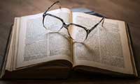 study - open book with glasses