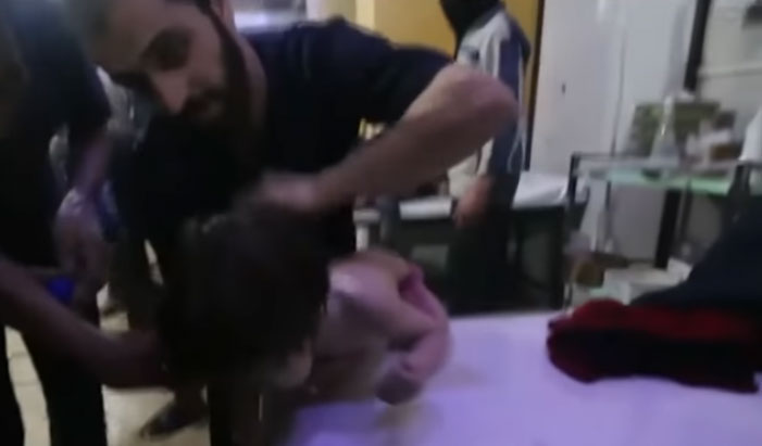 Baby treated at the Douma hospital. These images were widely circulated in the media as part of an effort to demonize Syria's Assad. / Image: CGA screenshot from news broadcast.